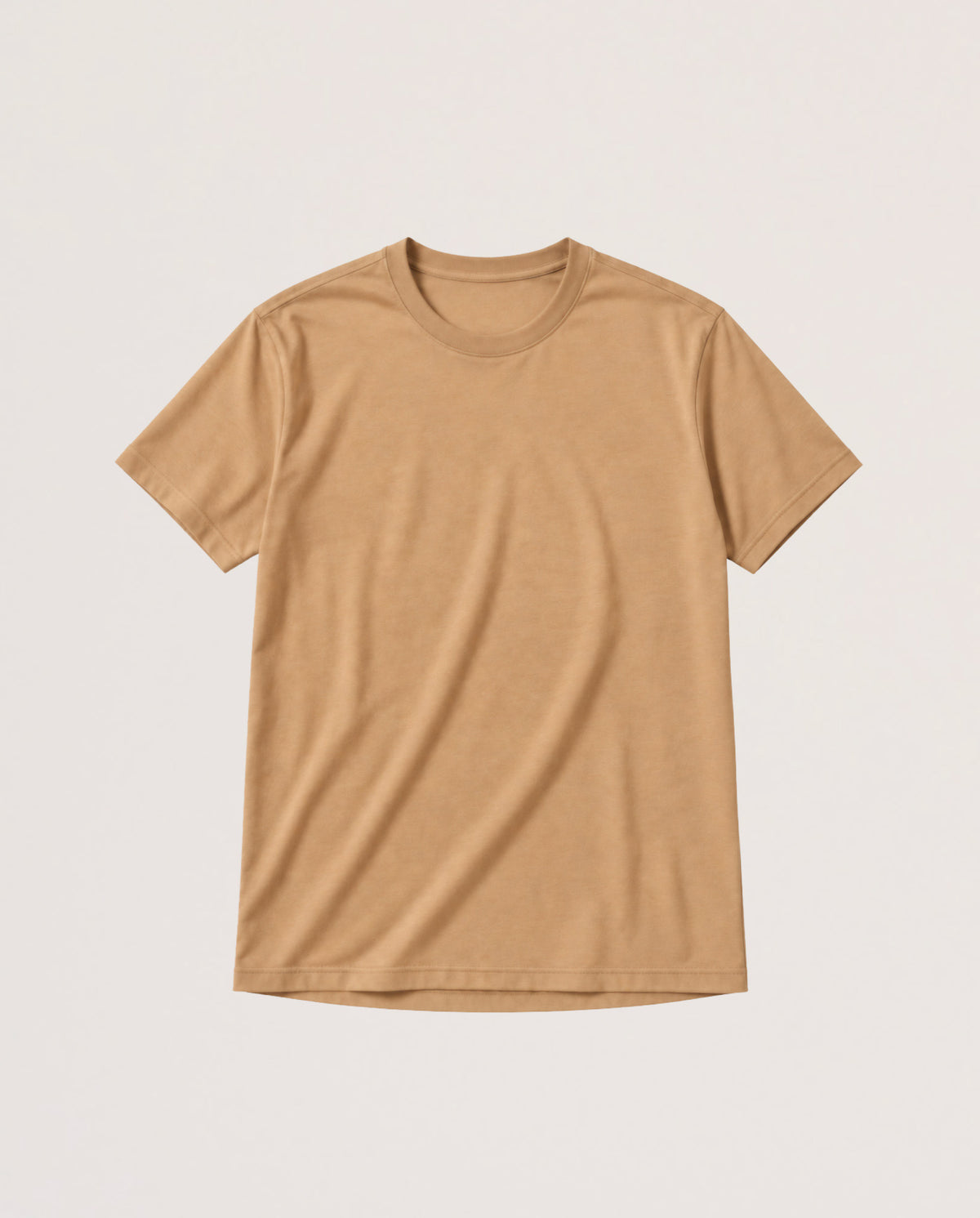 A plain short-sleeve crewneck t-shirt in a warm tan or camel color, laid flat against a light off-white background.