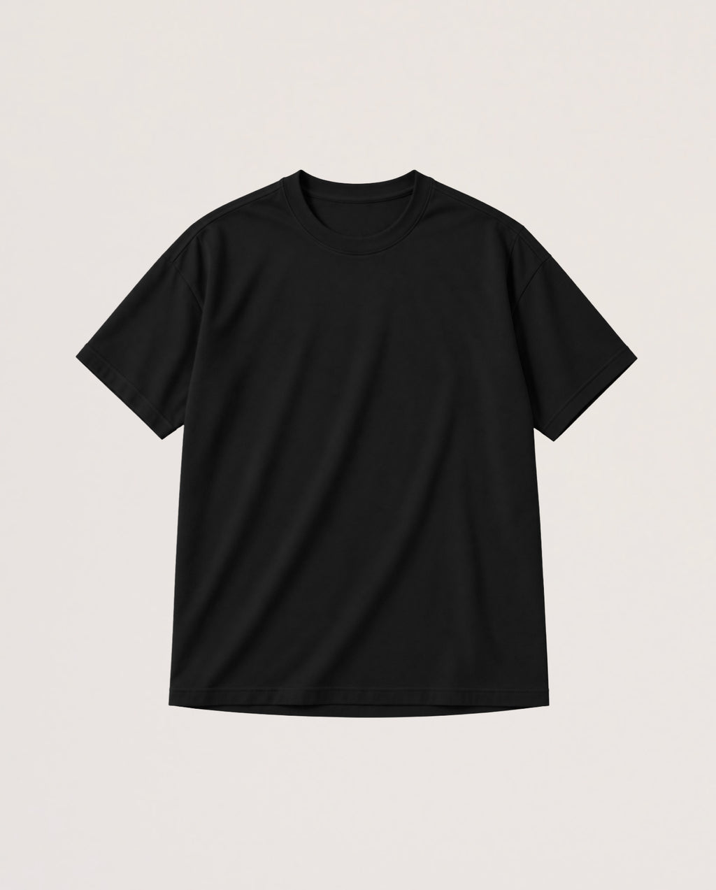 A plain black short-sleeve crewneck t-shirt laid flat against a light beige background.