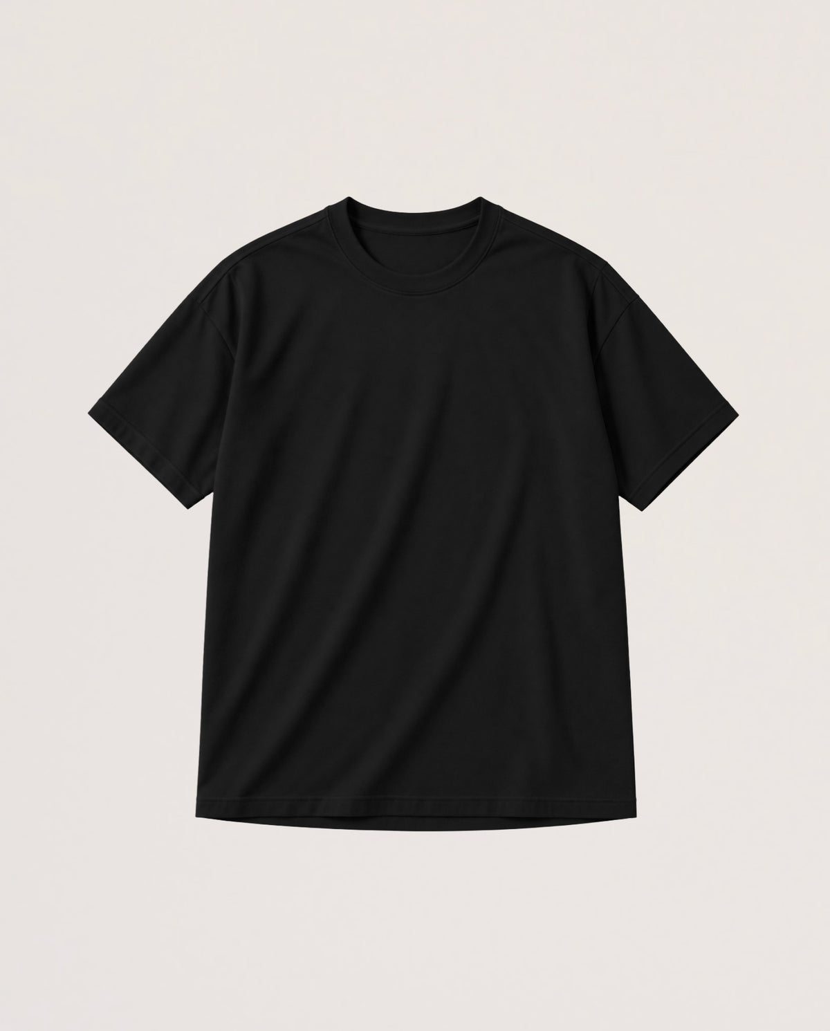A plain black short-sleeve crewneck t-shirt laid flat against a light beige background.