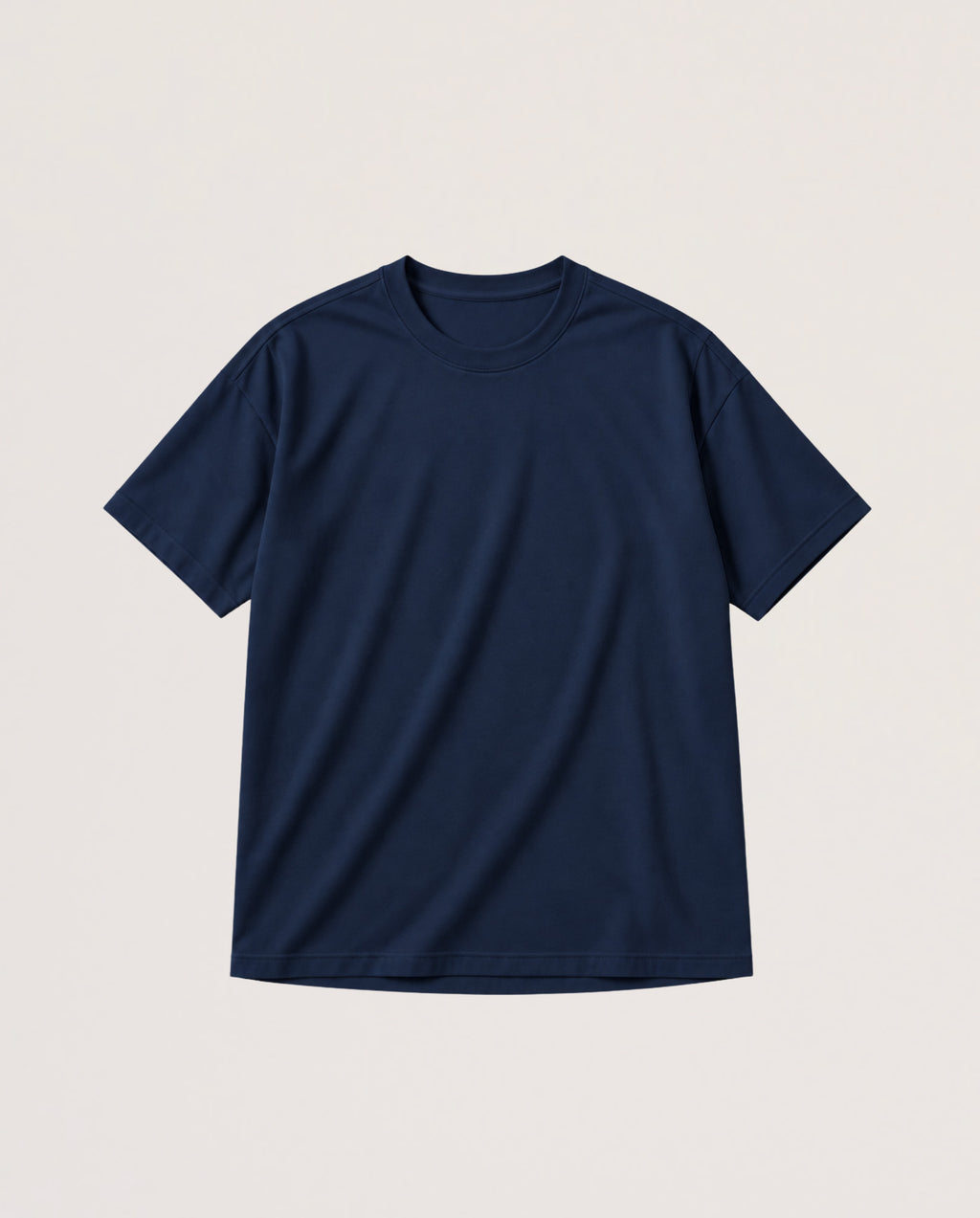 A navy blue short-sleeve crewneck t-shirt laid flat against a light beige background.