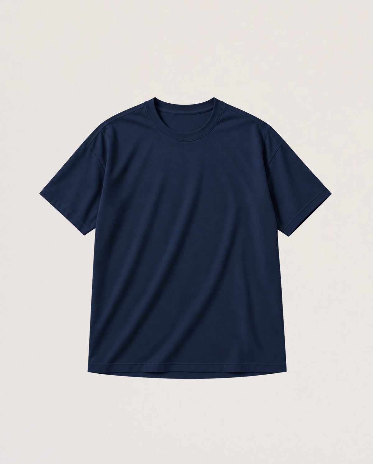 A navy blue short-sleeve crewneck t-shirt laid flat against a light beige background.