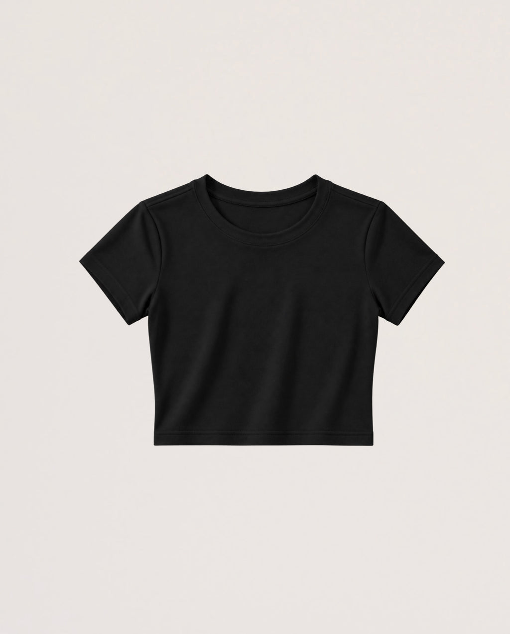 A black short-sleeve crop top t-shirt with a crew neck, displayed flat against a light beige background.