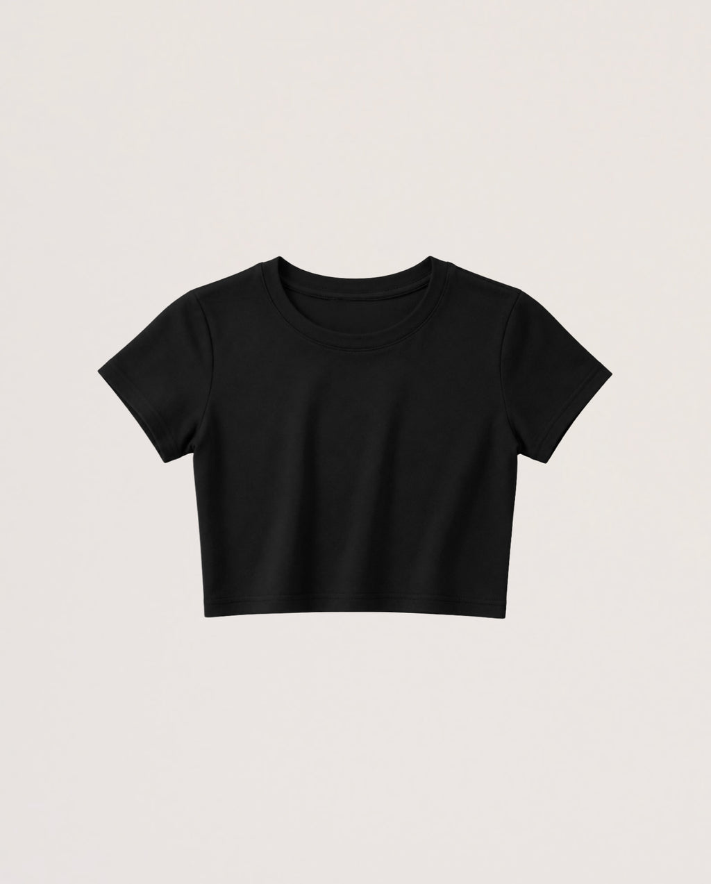 A black short-sleeve crop top t-shirt with a crew neck, displayed flat against a light off-white background.