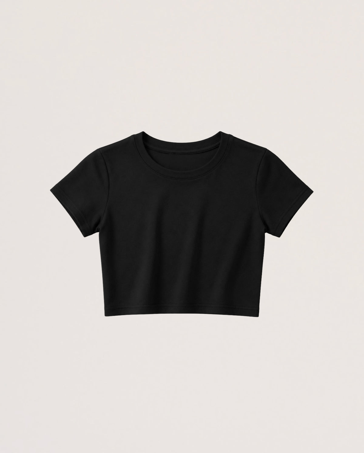 A black short-sleeve crop top t-shirt with a crew neck, displayed flat against a light off-white background.