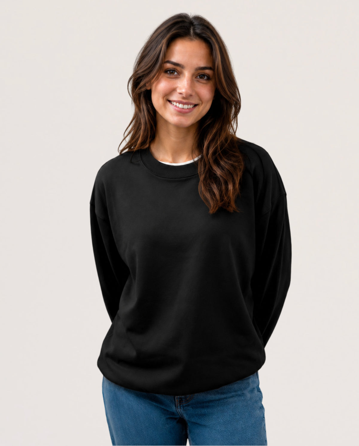 A model is wearing a black long sleeve shirt